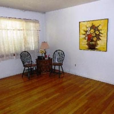 Living Room of Lovely 4-Bedroom Cape in Stapleton for sale in Staten Island New York