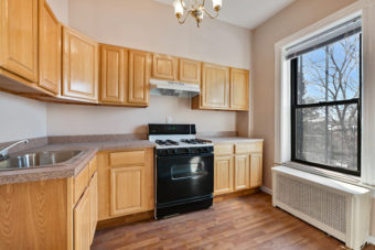 Kitchen of fabulous 3-family Townhouse in Sunset Park, Brooklyn for sale -- Kingsley Real Estate, Staten Island, New York