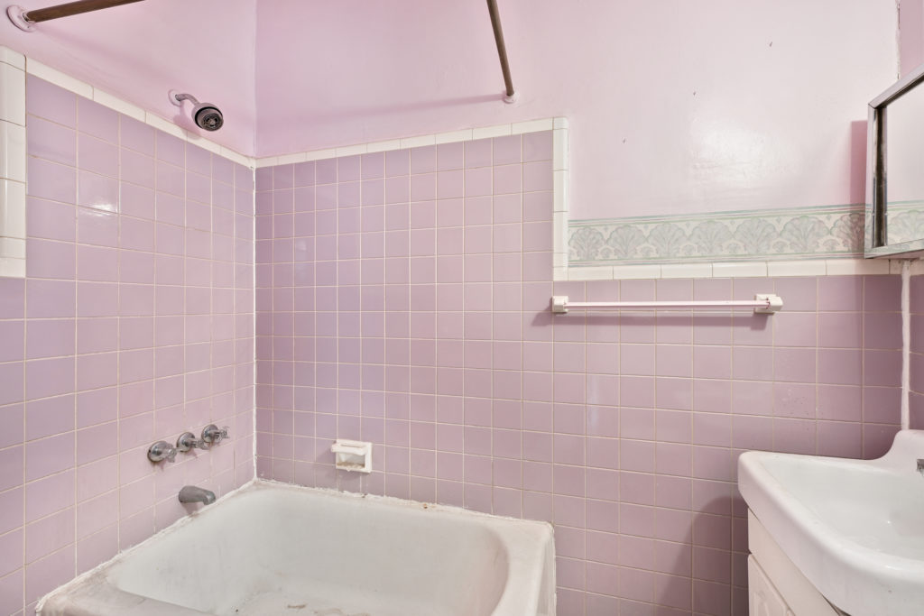 Bathroom of fabulous 3-family Townhouse in Sunset Park, Brooklyn for sale -- Kingsley Real Estate, Staten Island, New York